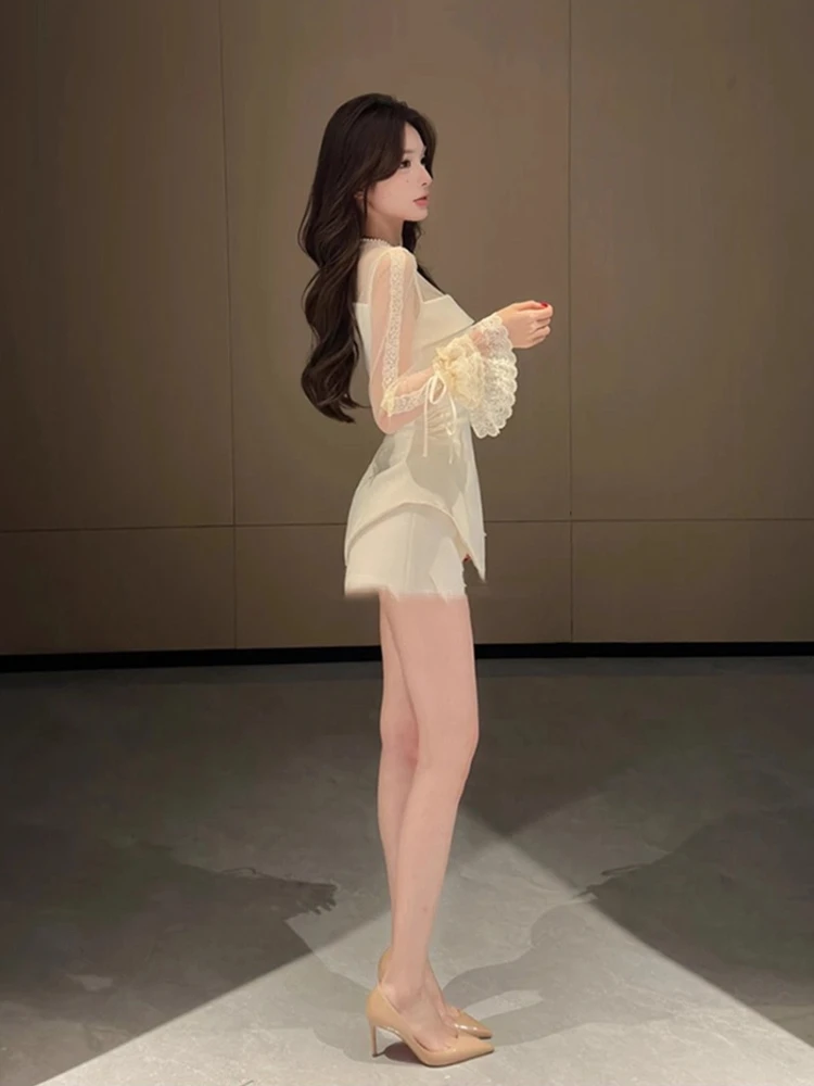 Inverno Nuovo Design Vedere Attraverso Maglia Nera T-shirt a maniche lunghe Donna Y2k Irregolare Slim Fit Magliette e camicette Francese Dolce Elegante Chic Abiti