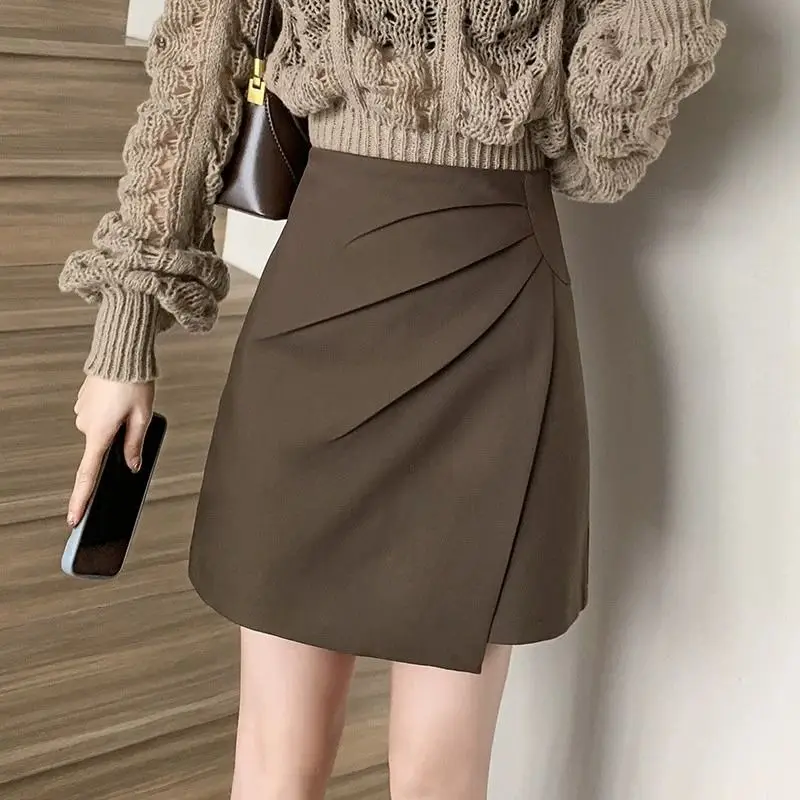 

Irregular skirt women's spring/summer 2024 new high-waisted hip pleats A-line anti-walking coffee color suit skirt