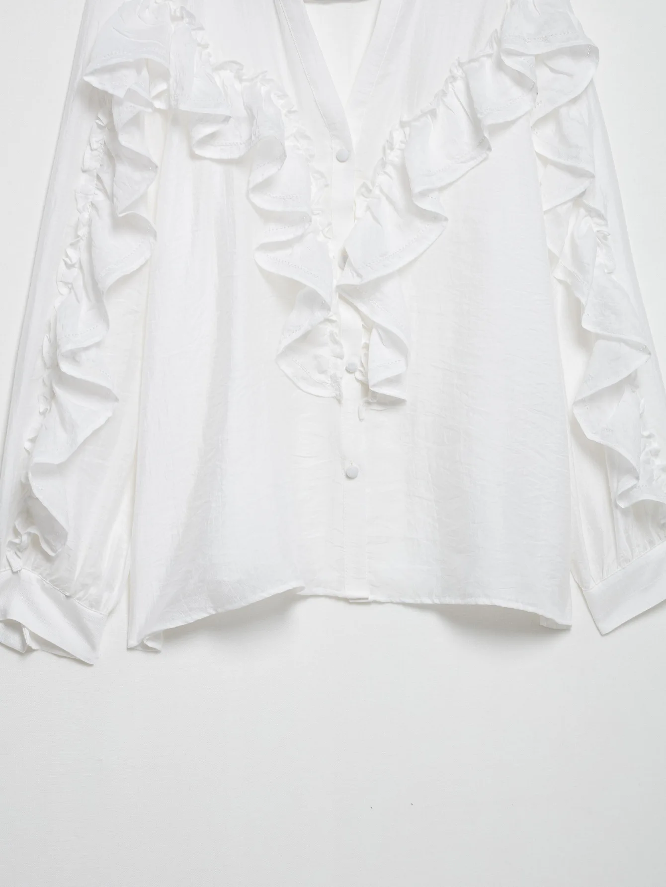 Nowa moda damska europejski styl amerykański bluzka w jednolitym kolorze na co dzień wiosenna pionowa koronkowa warstwowa dekoracyjna koszula Top