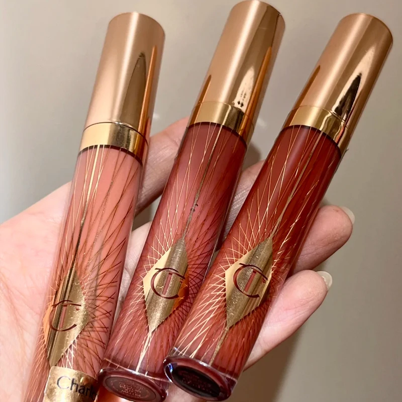 Charlotte Tilbury CT Water Glow Collagen Lip Gloss, Brillo Labial Hidratante, Paleta de Sombras de Ojos de Nueve Colores, Se Adapta a Todo Tipo de Looks de Maquillaje