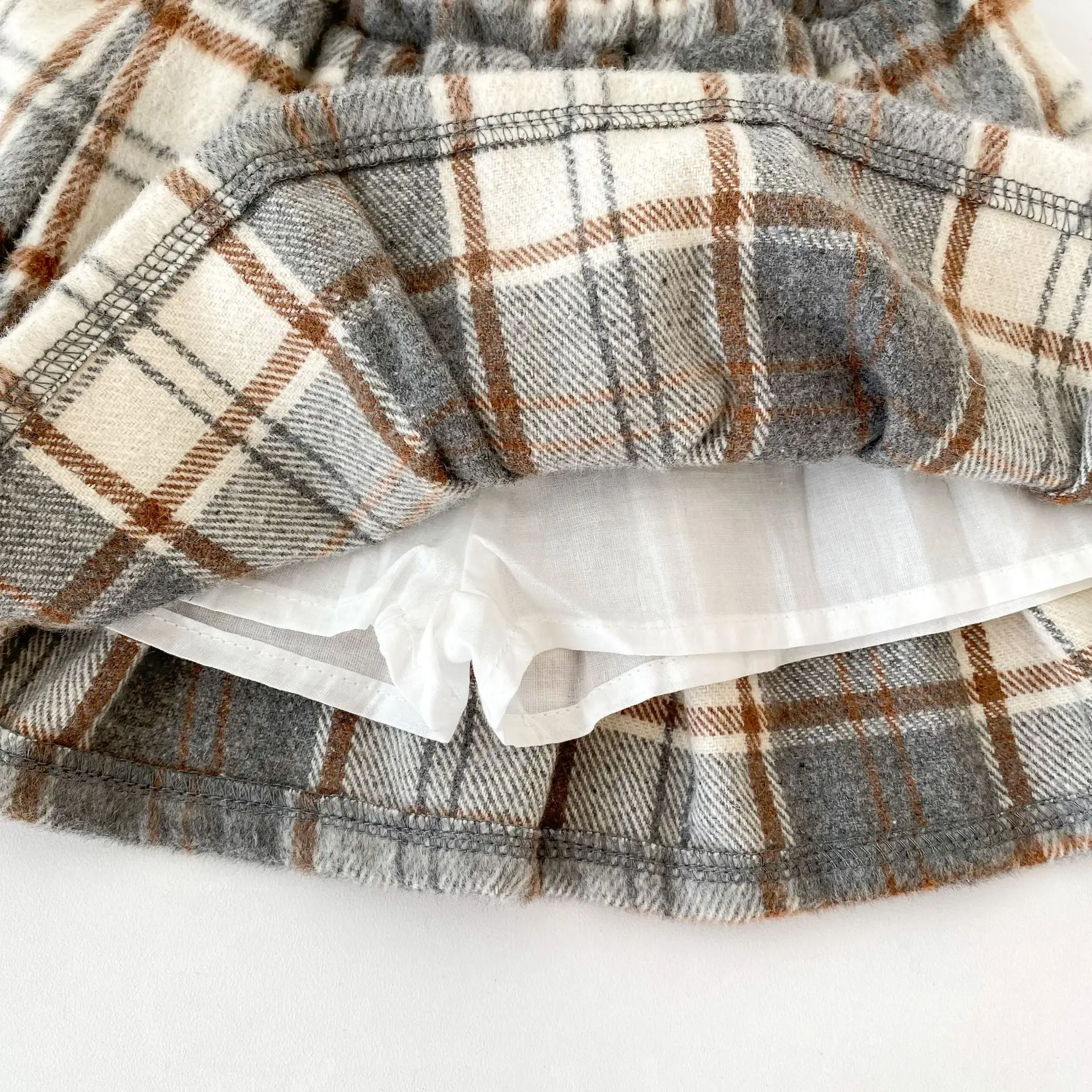 2026 Herbst Süßer Stil Kinderrock Karierter Plissee-Rock mit Elastikbund für 6M-4J Mädchen Vielseitiges Kinderkleid – Detail 13