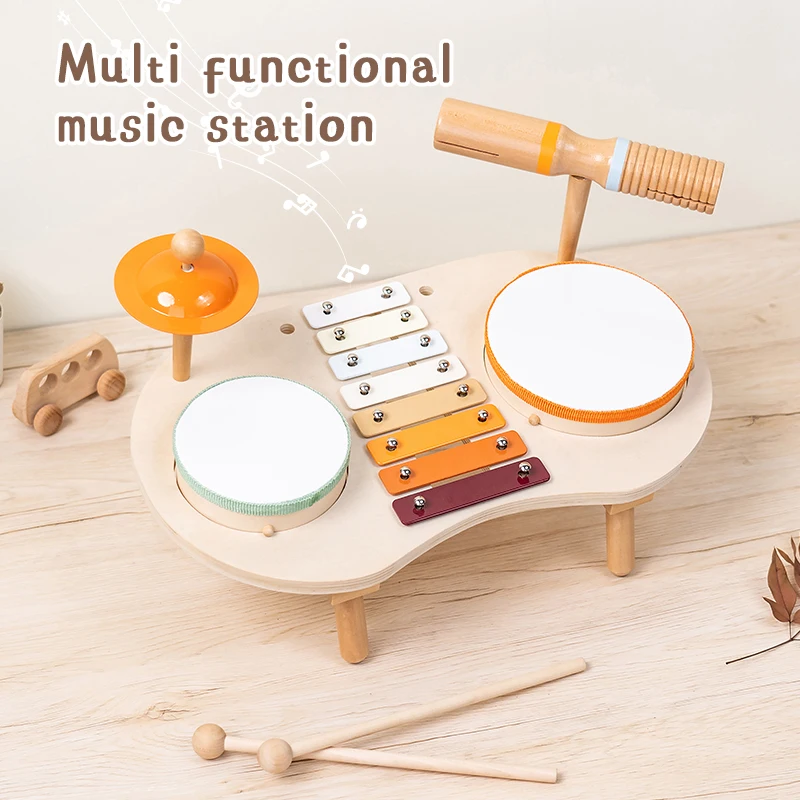 Set Mainan Musik Anak dari Kayu yang meliputi drum, xilofon, dan simbal—biarkan anak Anda bermain musik dengan ceria dan menjadi seorang kecil penari yang berbakat.