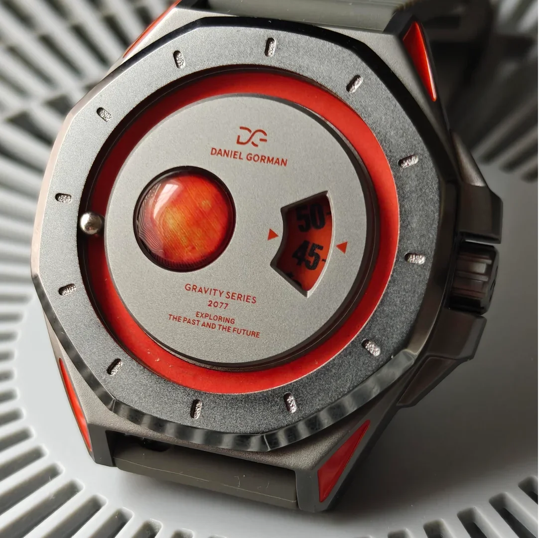

Daniel Gorman Magnetic Ball Watch Sci-Fi Design Rotating Disc Time Display Space Exploration Concept Unique Men's Wristwatch