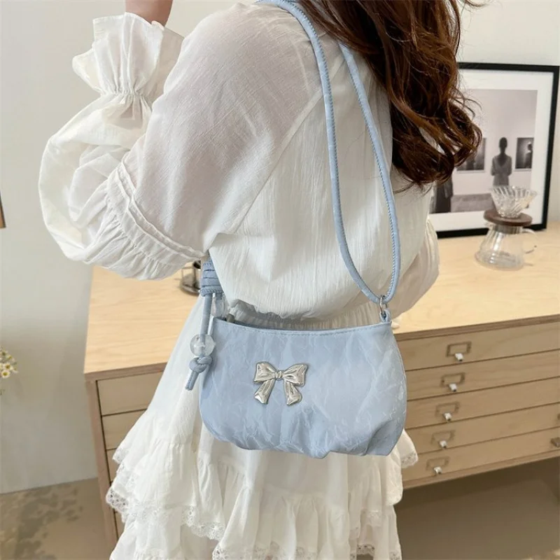 Tas Selempang Wanita yang Chic Terbuat dari Kulit Bermotif Bulan-Bintang dengan Tampilan Modern Harian yang Elegan dan Luas dari Paris. ​