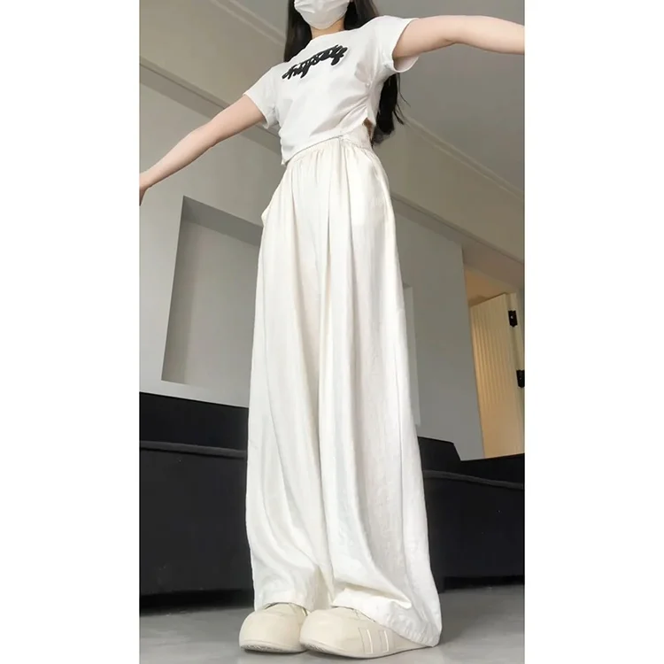 กางเกงขายาวผ้าไหมน้ำแข็งเนื้อฟองนม สไตล์ลำลอง ต่อต้านริ้วรอย สไตล์เกาหลี สำหรับผู้หญิง ฤดูใบไม้ผลิ ฤดูร้อน 2025 รุ่นใหม่ ไซส์เล็ก ระบายอากาศได้ดี ทรงขากว้าง