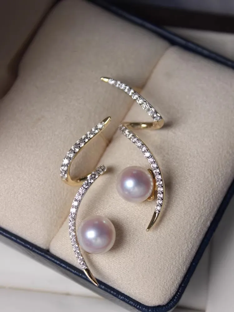 Fashionable and elegant AAAA 9-10 natural South Sea round pearl silver curved diamond studded earrings 925s customized version