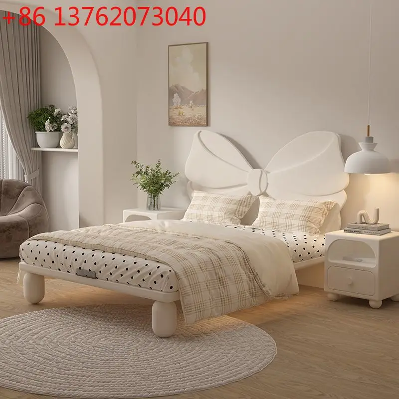 

Cute bow children's bed for girls with guardrails Modern simple solid wood bed