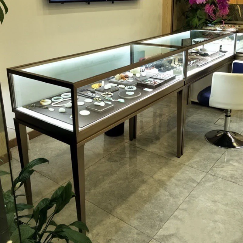 Escaparate de exhibición de tienda de joyas personalizado, moderno, con luz LED, Mostrador de vidrio de lujo al por menor