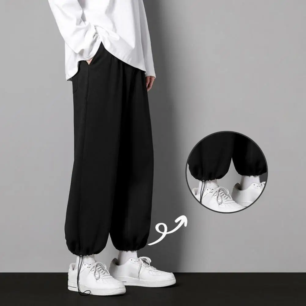 

Men Sweatpants Ankle-banded Solid Color Elastic Waist Sporty Pockets Keep Warm No Constraint Jogging Men Spring Pants