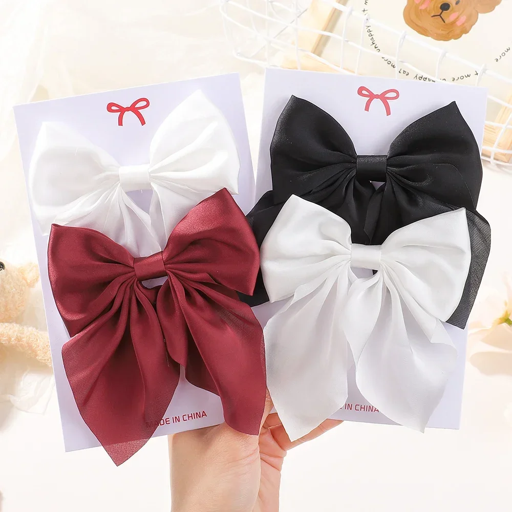 4-teiliges Set Elegante Große Satin-Haarschleifen für Frauen und Mädchen Süße Haarspangen Barrettes Pferdeschwanz-Clip Haaraccessoires Kopfschmuck