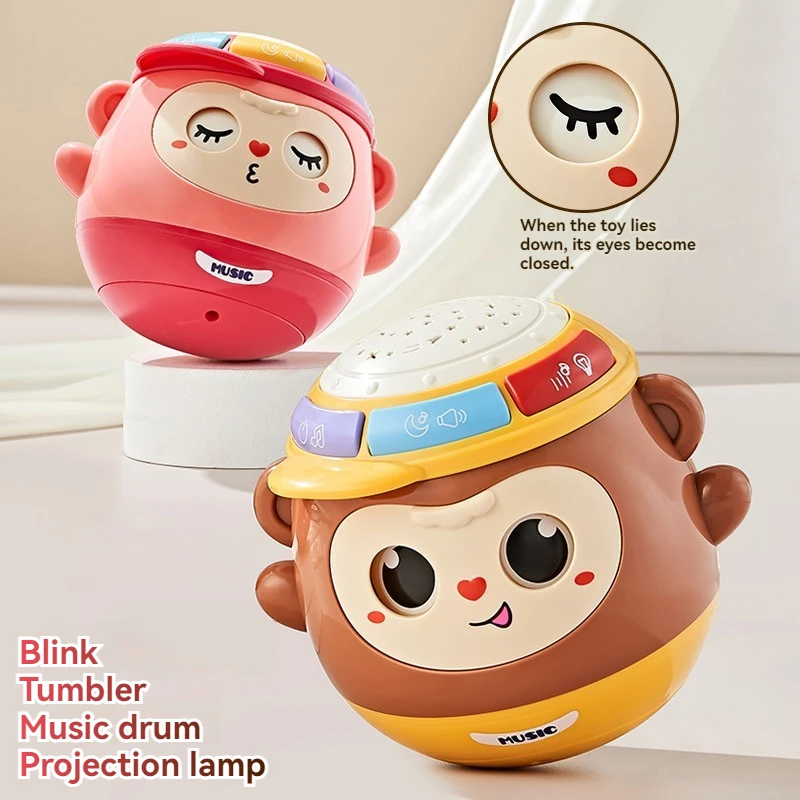 1 قطعة لعبة طبلة يدوية القرد يمكن وميضها ، التعليم المبكر متعددة الوظائف إيقاع الإسقاط لعبة طبلة يدوية مع الضوء والموسيقى