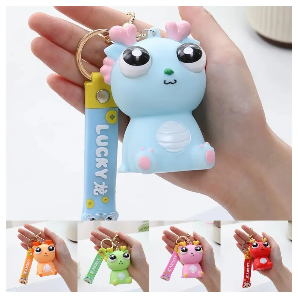 Cute Big Eyed Dragon Squishy Toy - Pop Eyes Fidget Keychain for Stress Relief Sensory Toy for Adults, Anxiety Relief Gift