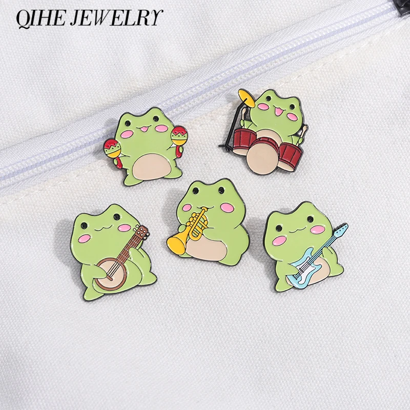 

Cartoon Frogs Music Band Enamel Pins Funny Cute Frog Playing Guitar Drum Brooches Lapel Badges Jewelry Gift for Kids Friends