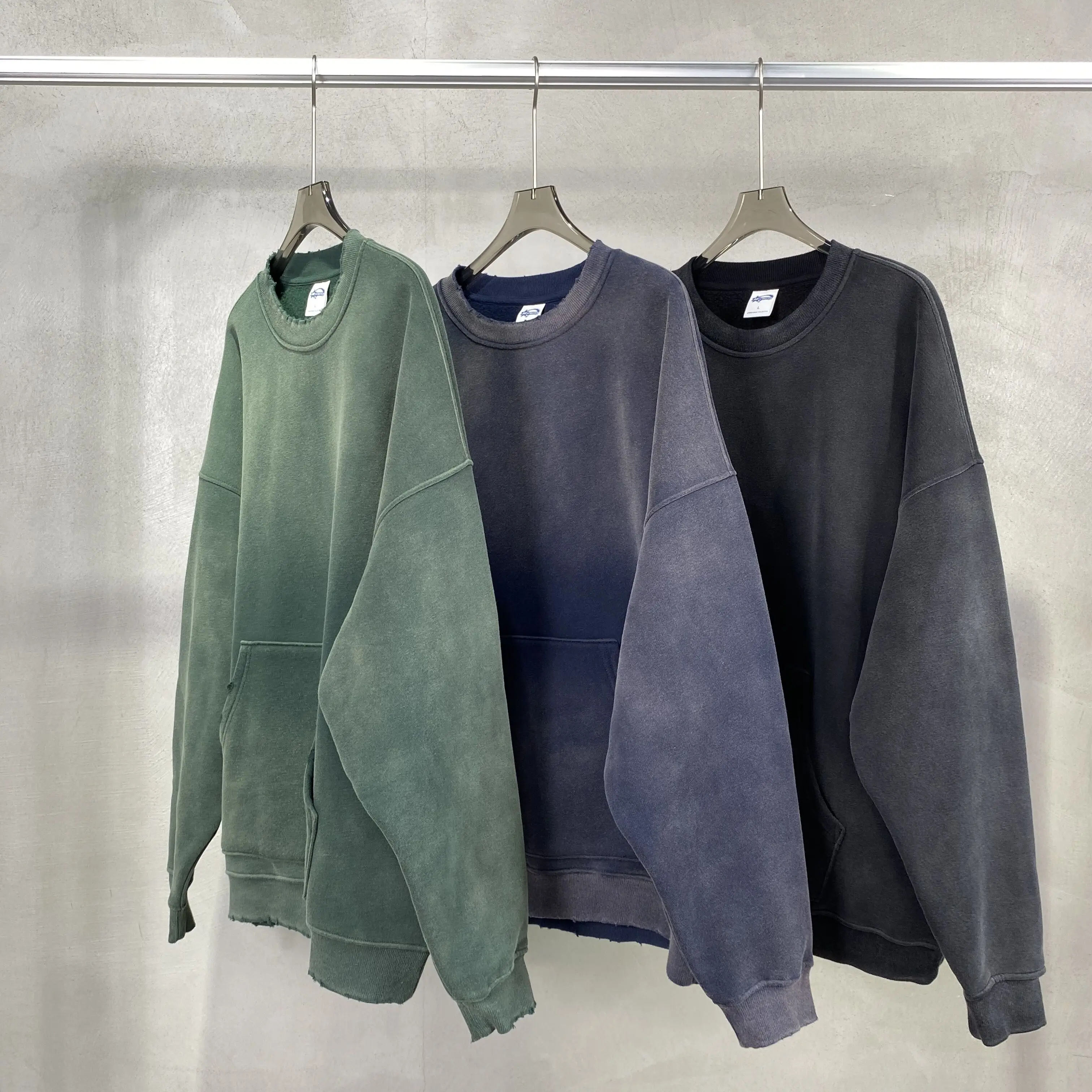 spray-dyed worn round neck sweater