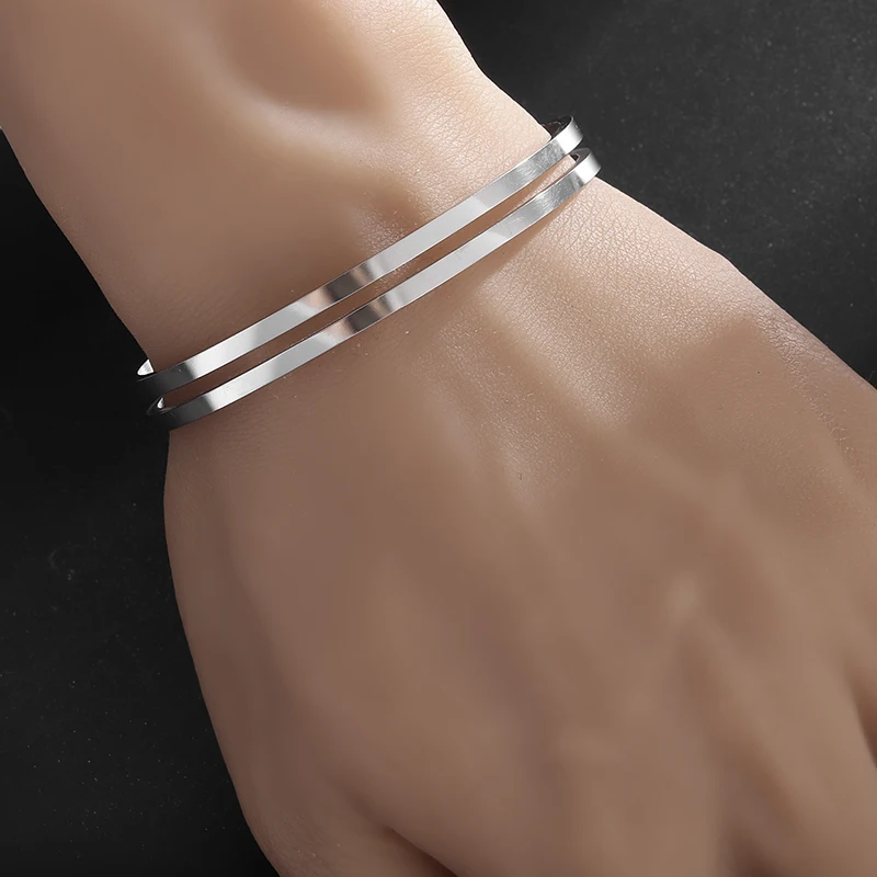 Bracciale aperto lucido a doppio strato semplice di alta qualità in acciaio inossidabile, gioielli da coppia con bracciale a due colori da uomo e da