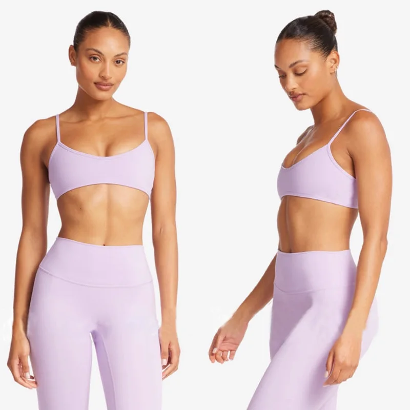 ملابس اليوغا المكونة من قطعتين من PMWRUIN للنساء: حمالة صدر رياضية بظهر Strappy وسراويل ضيقة قابلة للتنفس وقابلة للتمدد للياقة البدنية واليوجا والجري