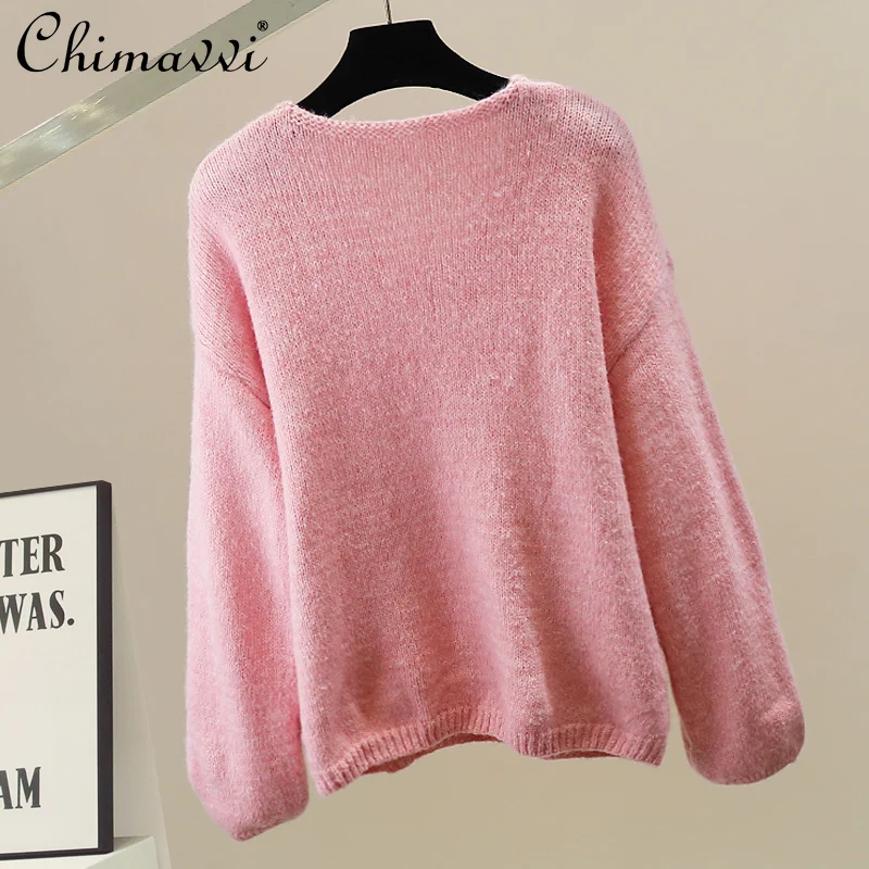 Suéter de flores 3D pesado de moda coreana Otoño e Invierno nueva dulce chica suelta elegante jersey de manga larga Top de punto