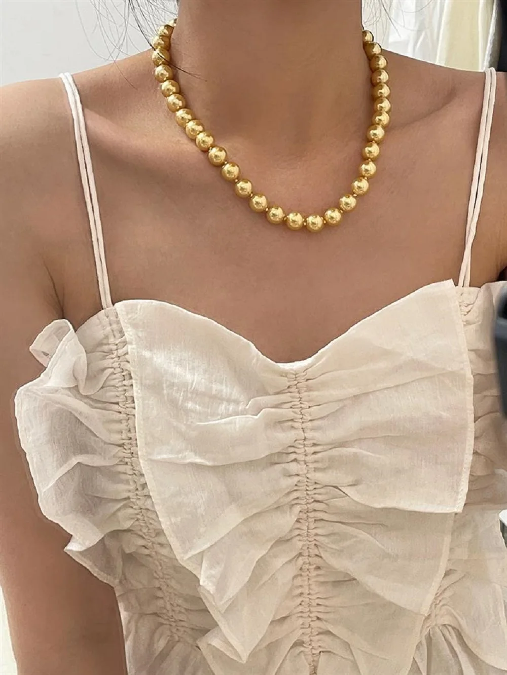 High quality AAAAAA perfect round artificial Nanyang gold bead knotted necklace with high-end feel 925 sterling silver ingot buc