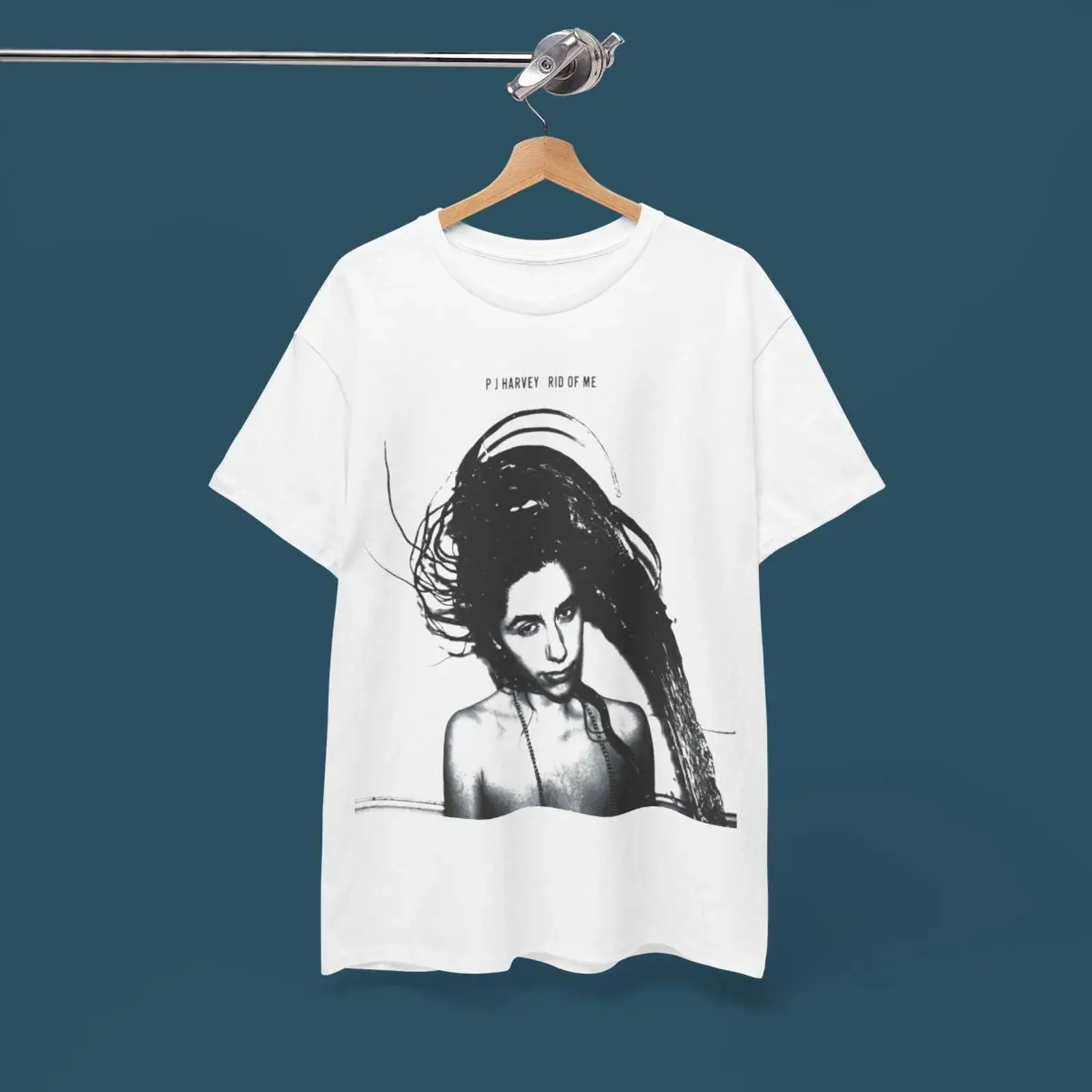 May include White t shirt with a black and image of PJ Harvey on the front is from album Rid Me vintage Washed Slightly