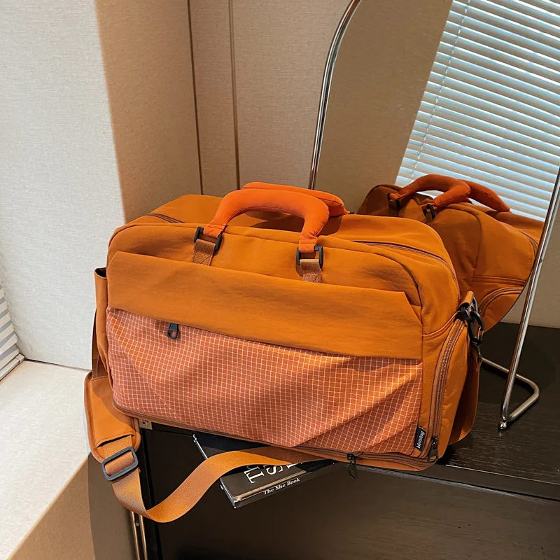 

Новая дорожная сумка большой вместимости, легкая сумка для ручной клади на короткие расстояния, корейская версия дорожной сумки, сумка для фитнеса, портативная сумка.