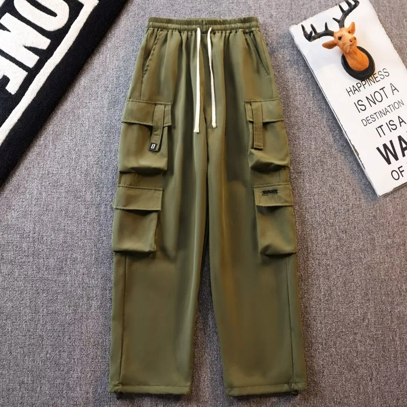 

Рабочие брюки осенью и зимой. Свободные тенденции и универсальные износостойкие рабочие брюки с множеством карманов. Японские мужские брюки с завязками.