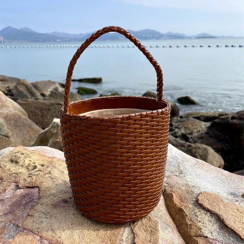 

Genuine leather hand-woven bucket bag 2025 niche design cowhide French vintage large capacity vacation beach bag women's handbag