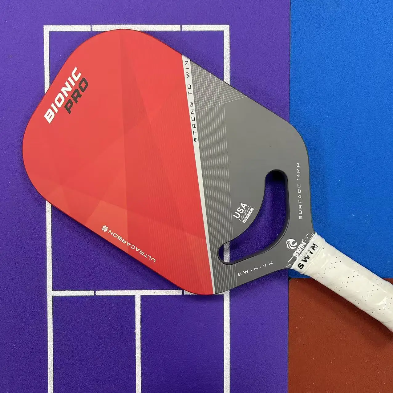 La nuova racchetta senza telaio presenta un design con faccina e fibra di carbonio da 14 mm di livello professionale per prestazioni nella pagaia da pickleball