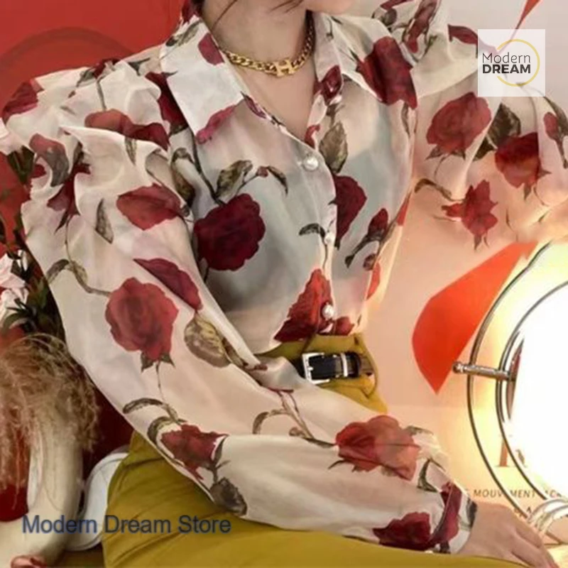 

Korean version of lapel puff sleeve rose print cover meat slim sweet chiffon shirt women's summer new high-grade design top.