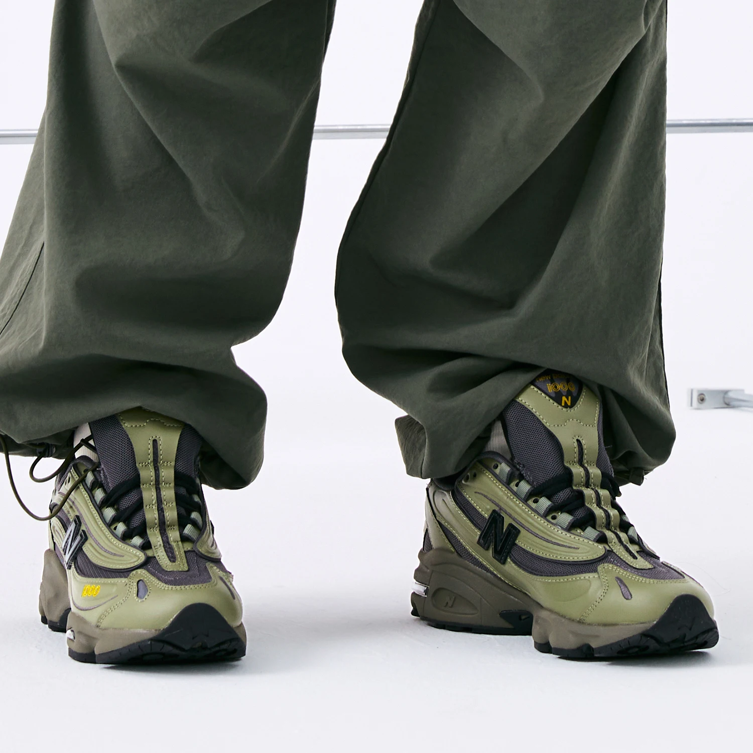 New Balance NB 1000 - حذاء جري كاجوال منخفض القطع للرجال والنساء، لون أخضر عسكري