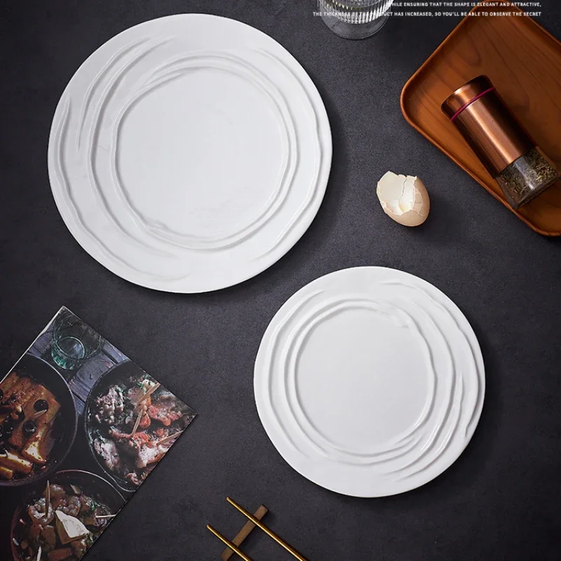 White Ceramic Wavy Western Food Plate Creative Irregular Pastry Dessert Round Flat Plate Table Setting in Hotel Restaurant