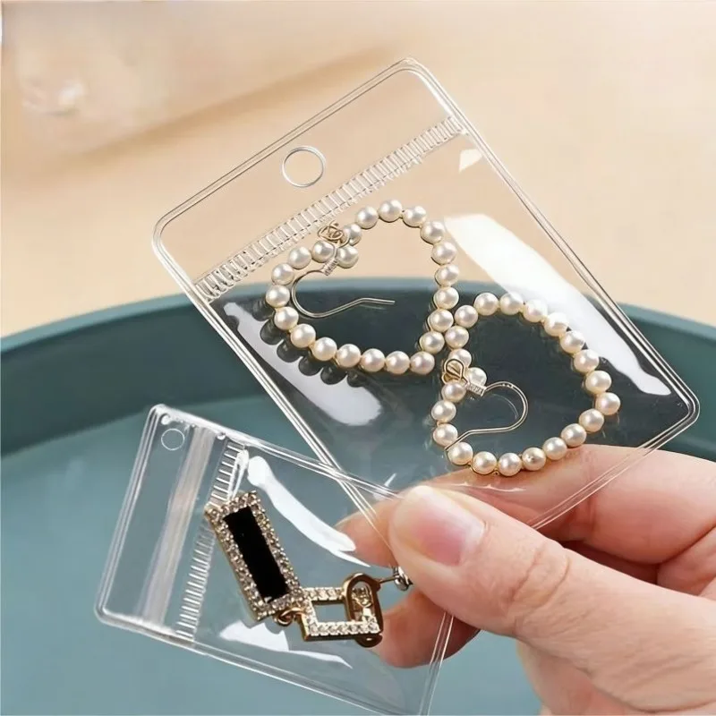 100/50 Stück transparente, selbstdichtende Ziplock-Beutel aus PVC, staubdicht, wiederverschließbar, Schmuckbeutel für Ringe, Ohrringe, Armbänder, Halsketten – Detail 3
