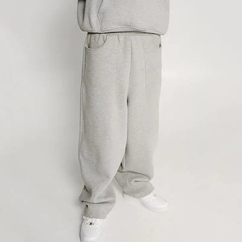 2025 نمط جديد ملابس رياضية غير رسمية السراويل Y2K نمط الشارع متعددة جيب فضفاضة ومريحة Sweatpants للرجال والنساء