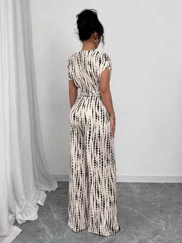 Imagen 2 del producto Mono a rayas europeo y americano, estilo de vacaciones de verano, mono con tirantes inclinados, pantalones de pierna ancha