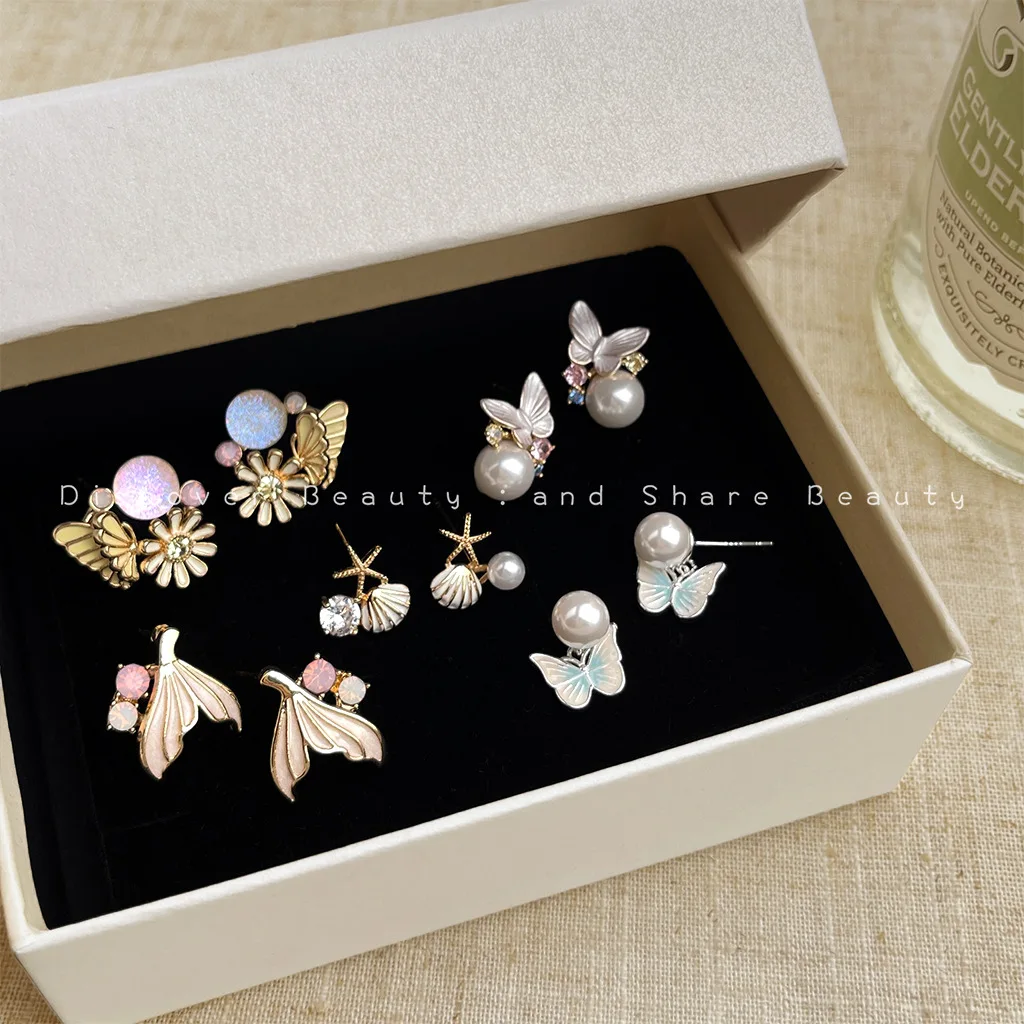 

Аксессуары для самостоятельного изготовления: корейские серьги-гвоздики с бабочками, цветами и жемчугом, французские серьги с цирконами в форме рыбьего хвоста, свежий и нежный стиль.