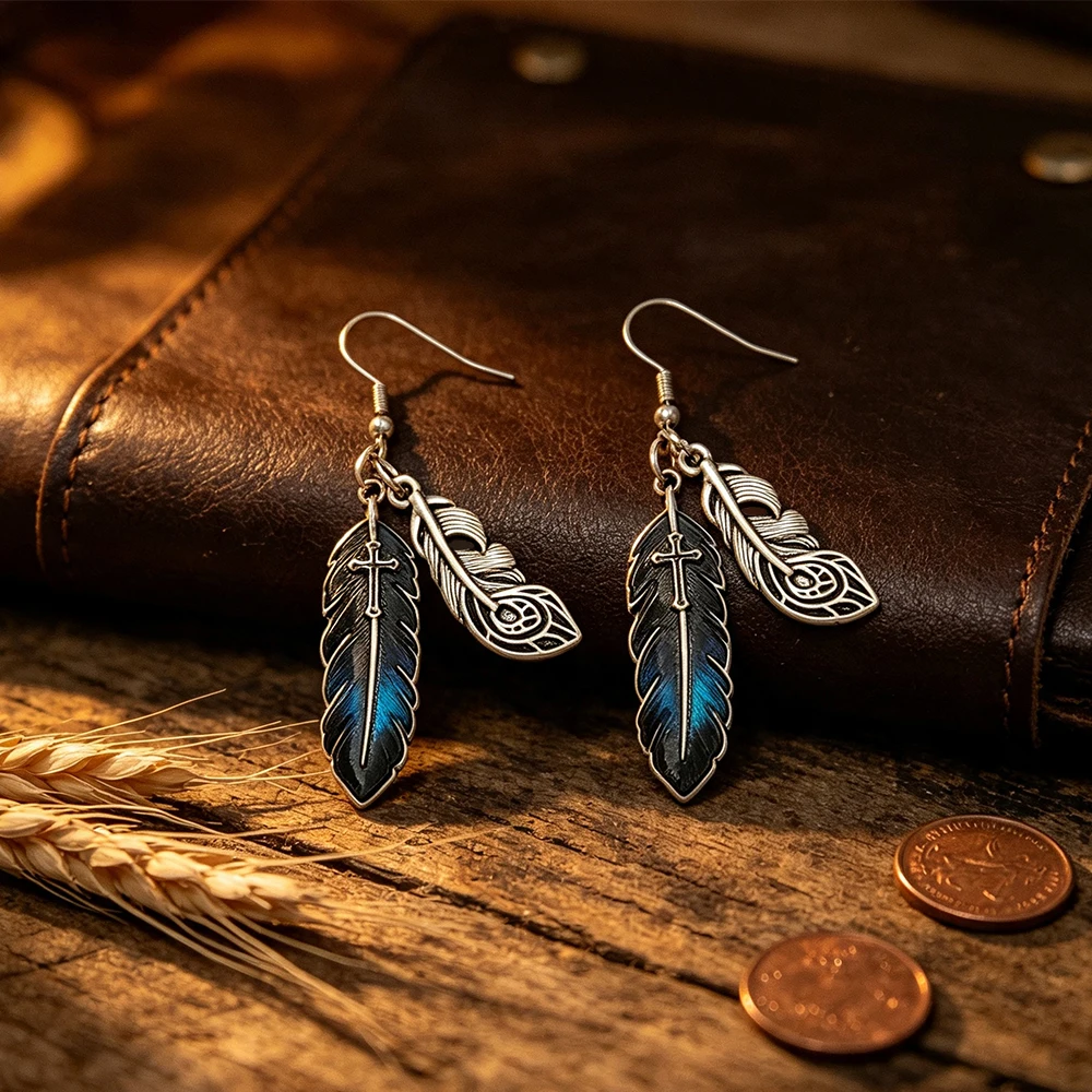 Vintage distressed silver double feather cross dangle earrings, blue and black enamel, western style, unique long earrings for women