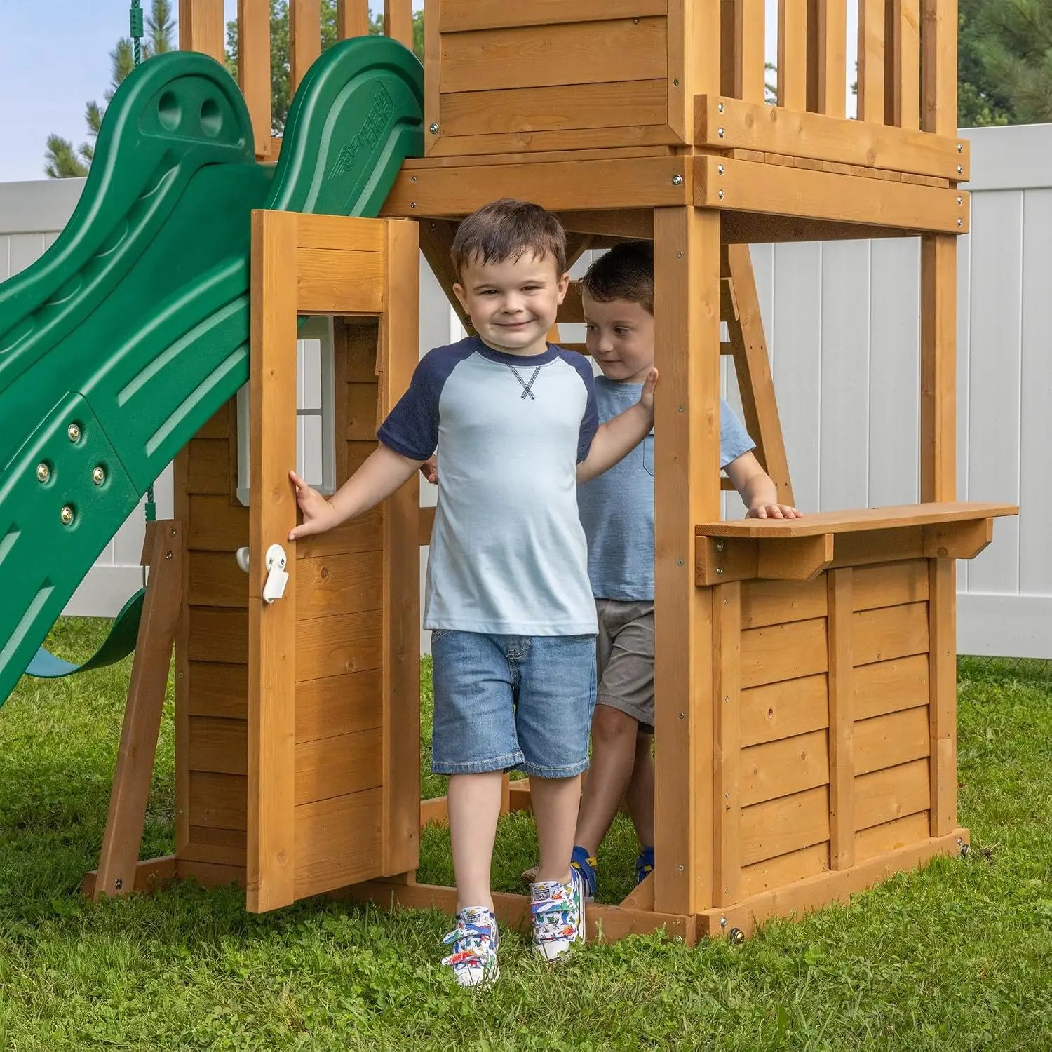 Fall River Nordic Spruce Swing Set with Wave Slide, Clubhouse, Playhouse, Snack Bar Window, Belt Swings, Full Front Door, Window