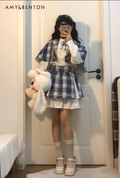 

2026 Spring Summer Women's Japanese Preppy Style Plaid Cloak High Waist Skirt White Bow Shirt Three Piece Outfit for Daily Wear