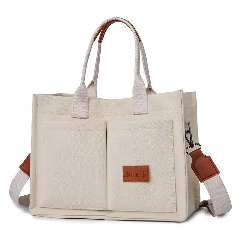

Canvas bag women's large-capacity multi-pocket shoulder bag lady hand-held tote bag