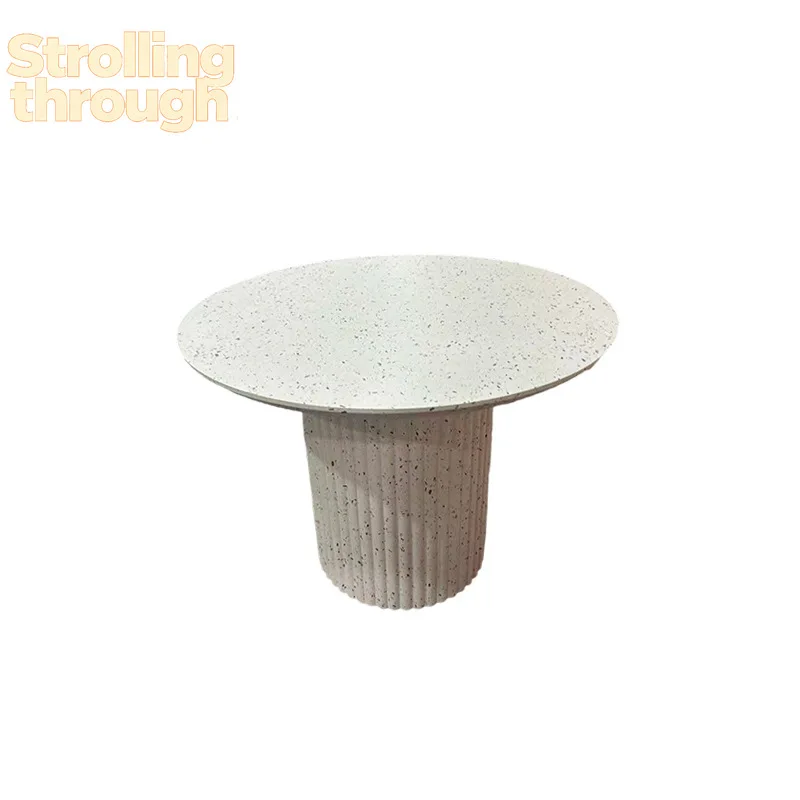 

Modern simple small apartment dining table Roman column single foot cream wind coffee table wabi sandy wind creative round