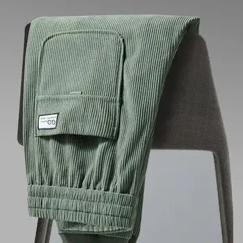 Moda Elastyczna talia Męskie aksamitne zagęszczone polarowe spodnie sztruksowe Męskie wszechstronne jesienne i zimowe spodnie Harlan Taped Casual Pants