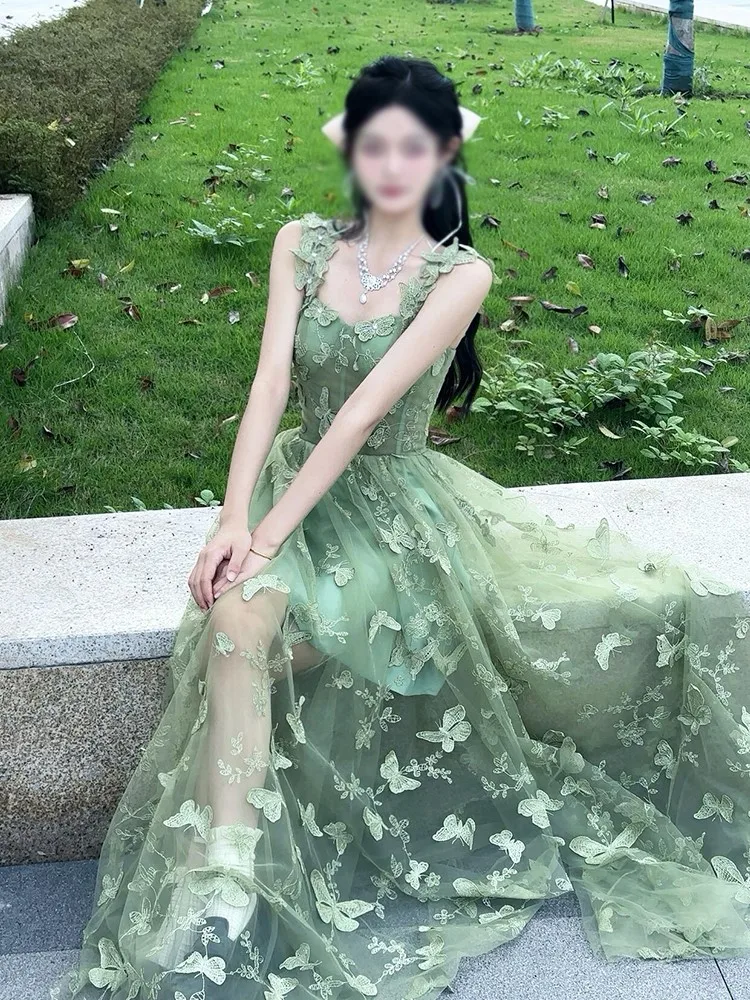 

A green strappy net gauze ethereal light luxury and niche adult ceremony art examination host dress