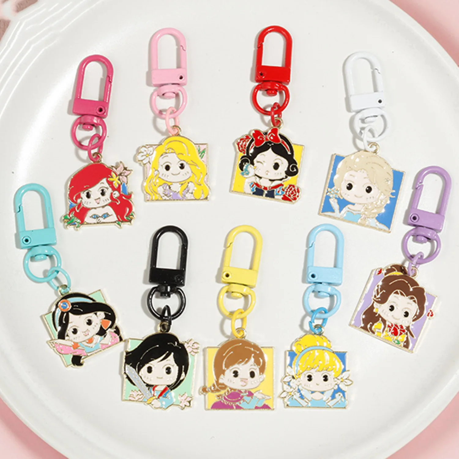 

Disney Princess Keychain Belle Elsa Tiana Cinderella Ariel Jasmine Angel Action Anime Figure Cute Cartoon Backpack Keyring Gifts