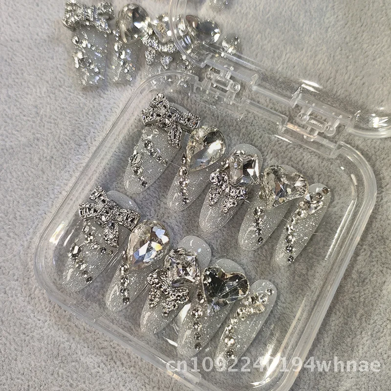 

Xi Shiji Полный алмазный лист для дизайна ногтей Тяжелая промышленность Ручная броня Съемные накладные ногти Длинная лестница Овальные стили для женщин