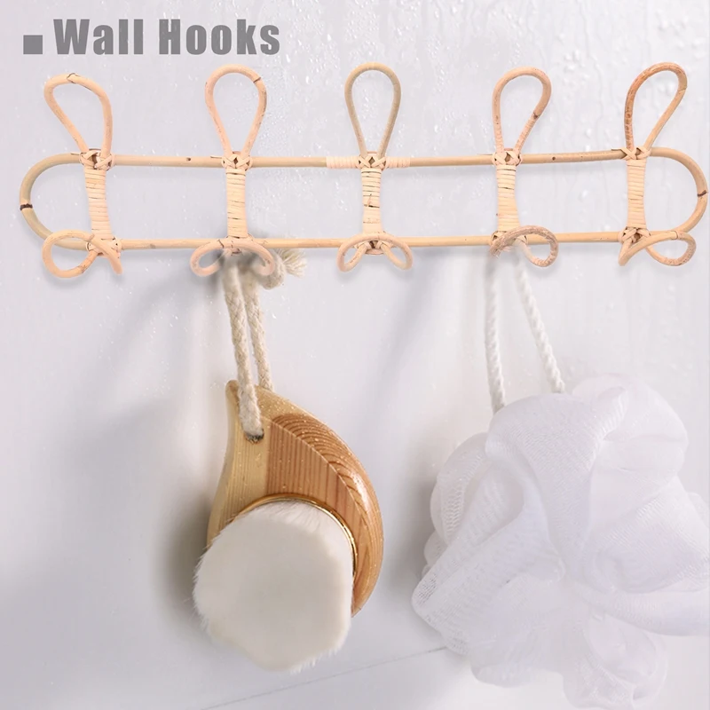 Aesthetic arrangement showing the rattan wall hook holding kids clothing in a cozy bedroom