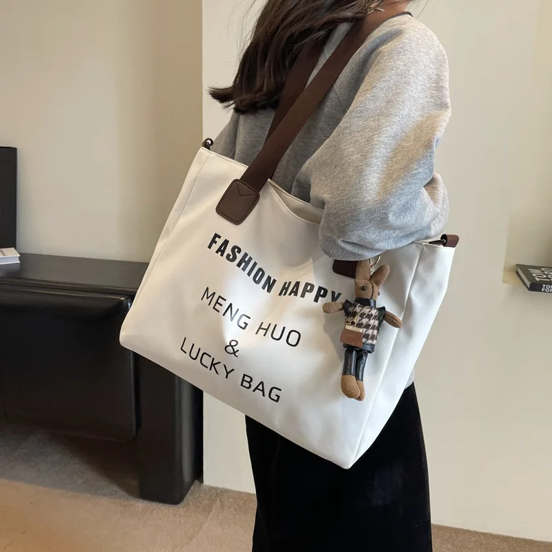

New in Large Capacity Canvas Tote Bag for Women Literary Minimalist School Bags Crossbody Shoulder Bag with Cute Pendant