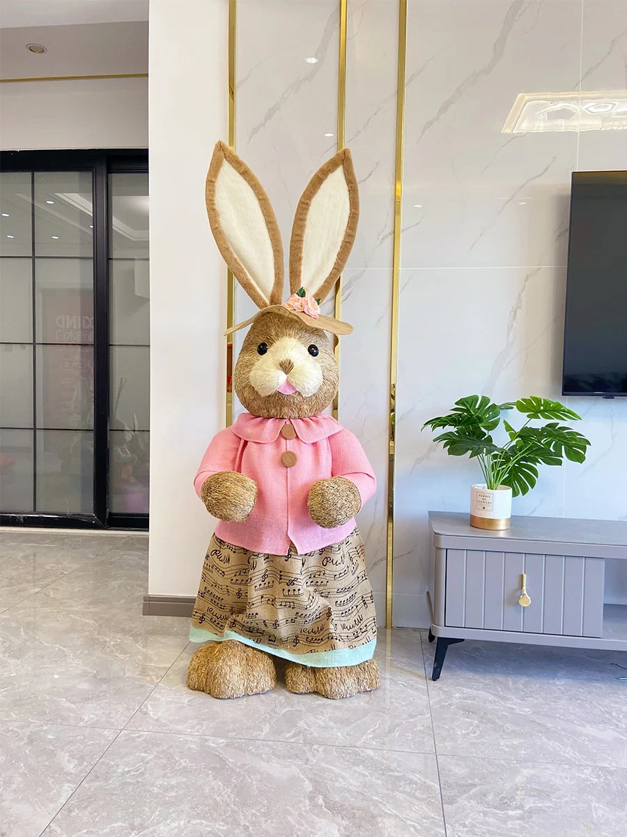 Floor-to-ceiling straw rabbit ornaments in the living room