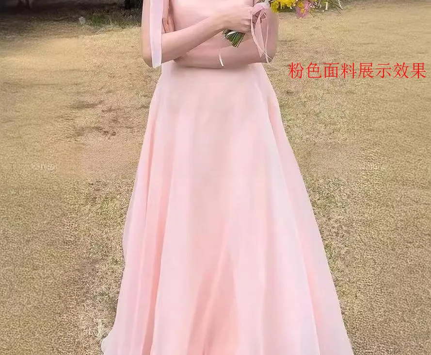 

Modern bridal sophistication. A sleek, off-the-shoulder gown that blends minimalist luxury with a graceful train for your specia