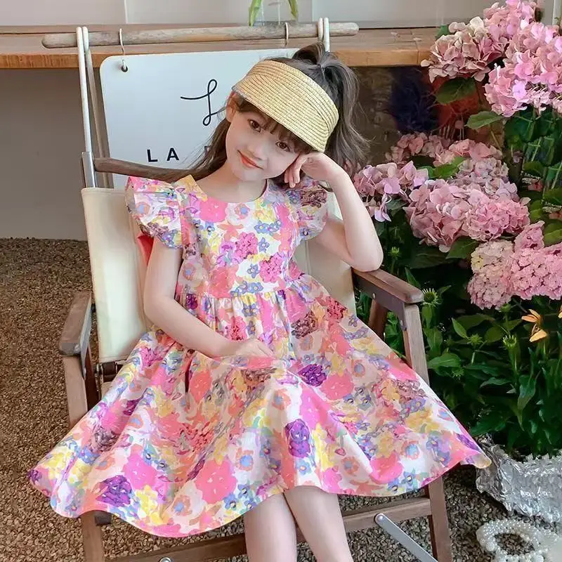 

3-12 Years Girls' Summer Fragmented Flower Dress New Children's Fashionable Open Back Skirt with Bow and Big Girl Princess Dress
