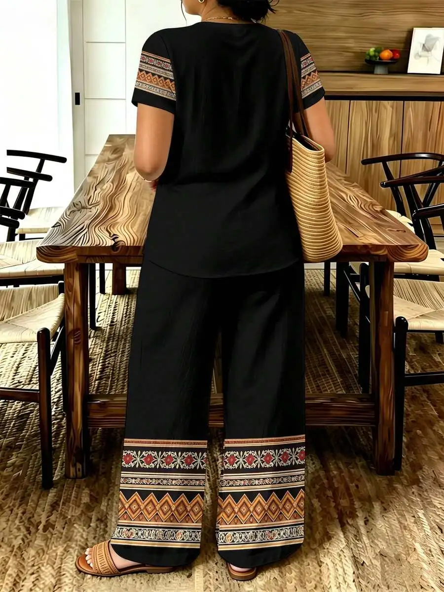 

Black Plus Size Women’s Loose Two-Piece Set: Short Sleeve V-Neck Top And High-Waist Wide-Leg Pants With Tribal Geometric Trim