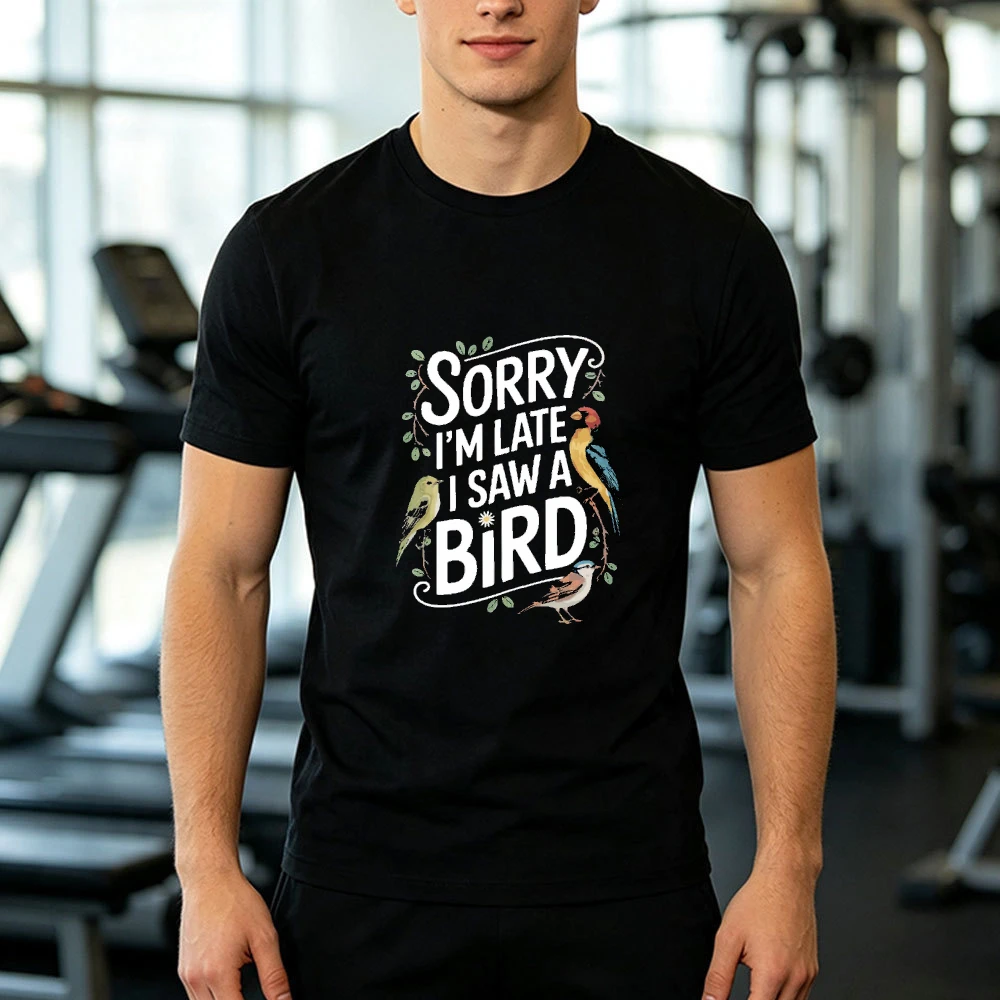 Sorry I Am Late I Saw A Bird Charming Avian Characters Group Print Male Black T Shirt Humorous Wildlife Lover Graphic Tee